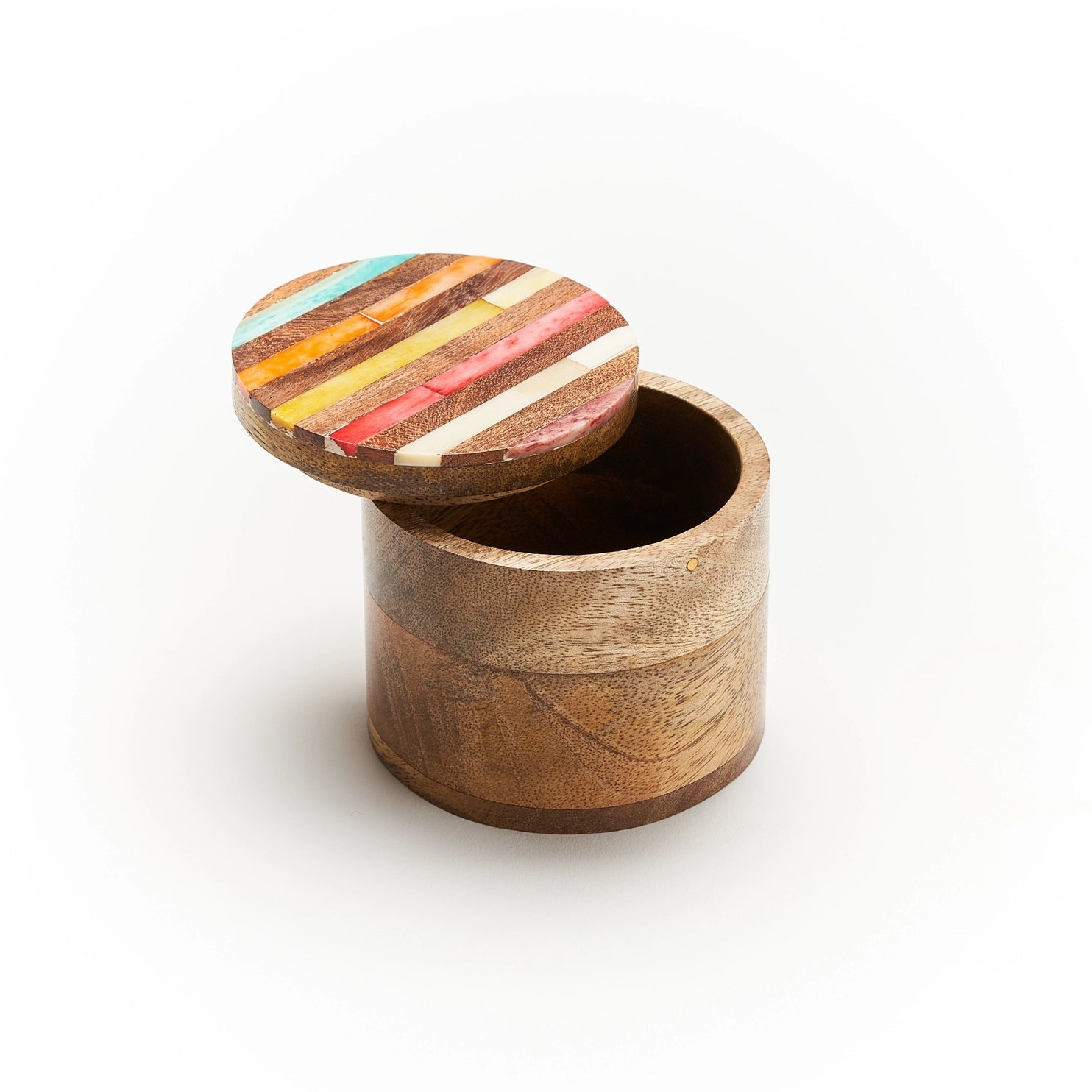 Wooden box with a colorful striped lid on a white background