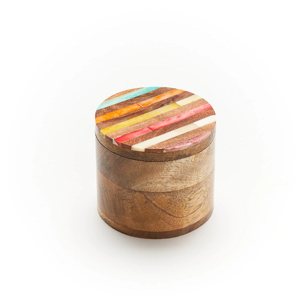 Wooden box with a colorful lid on a white background