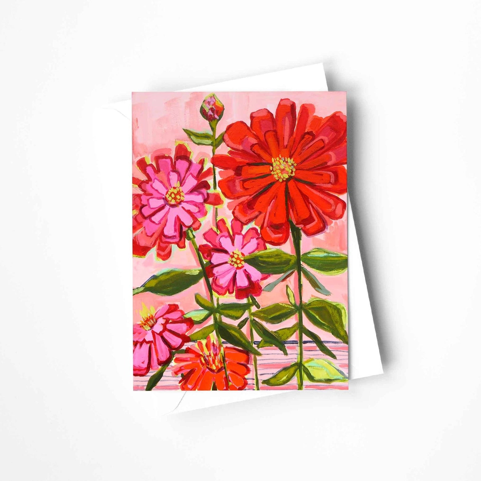 Greeting card with red and pink floral design on a white background