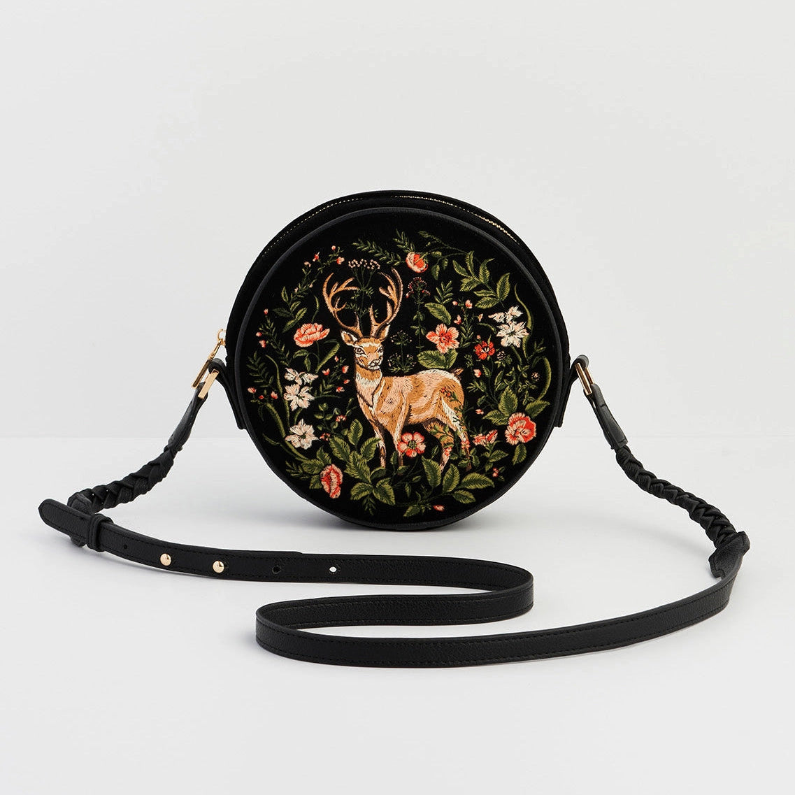 Round bag with deer and floral design on a white background